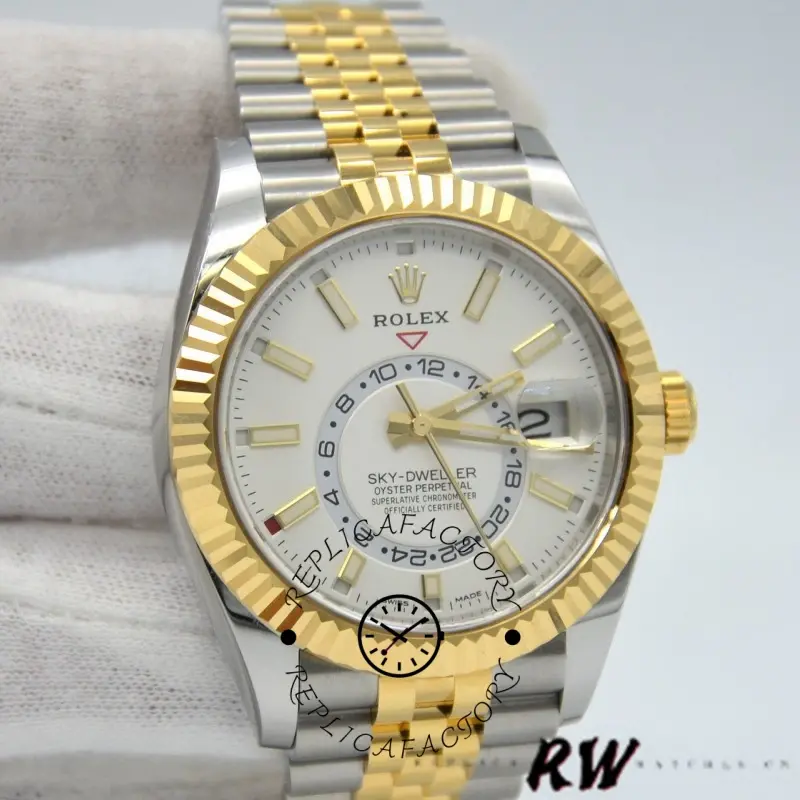 Angled close-up of Rolex Sky-Dweller 326933 showing fluted bezel and white dial.