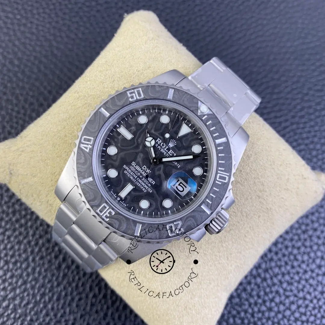 Custom Rolex Submariner 116610 carbon fiber, front view on beige pillow.