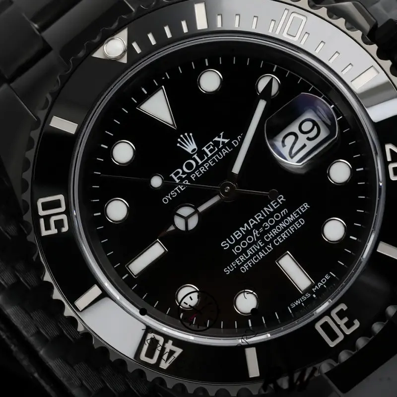 Rolex Submariner 116610LN, black dial close-up with date window and bezel markings.