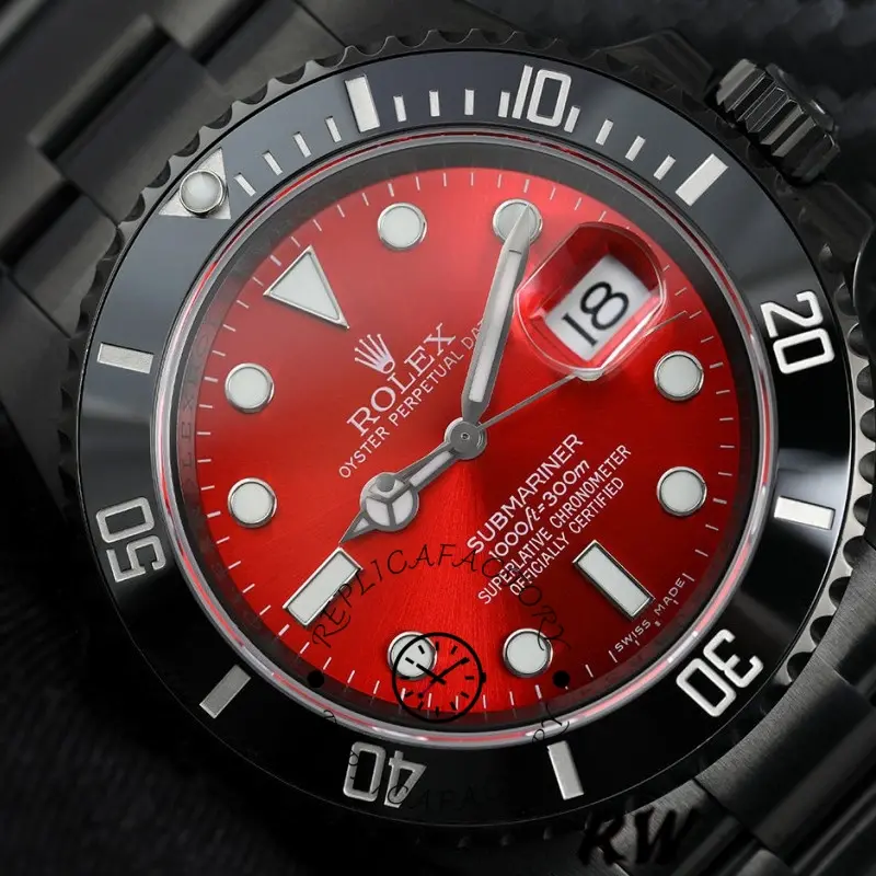 Close-up of Rolex Submariner Date 116610LN showing the red dial, date window, and bezel numerals.