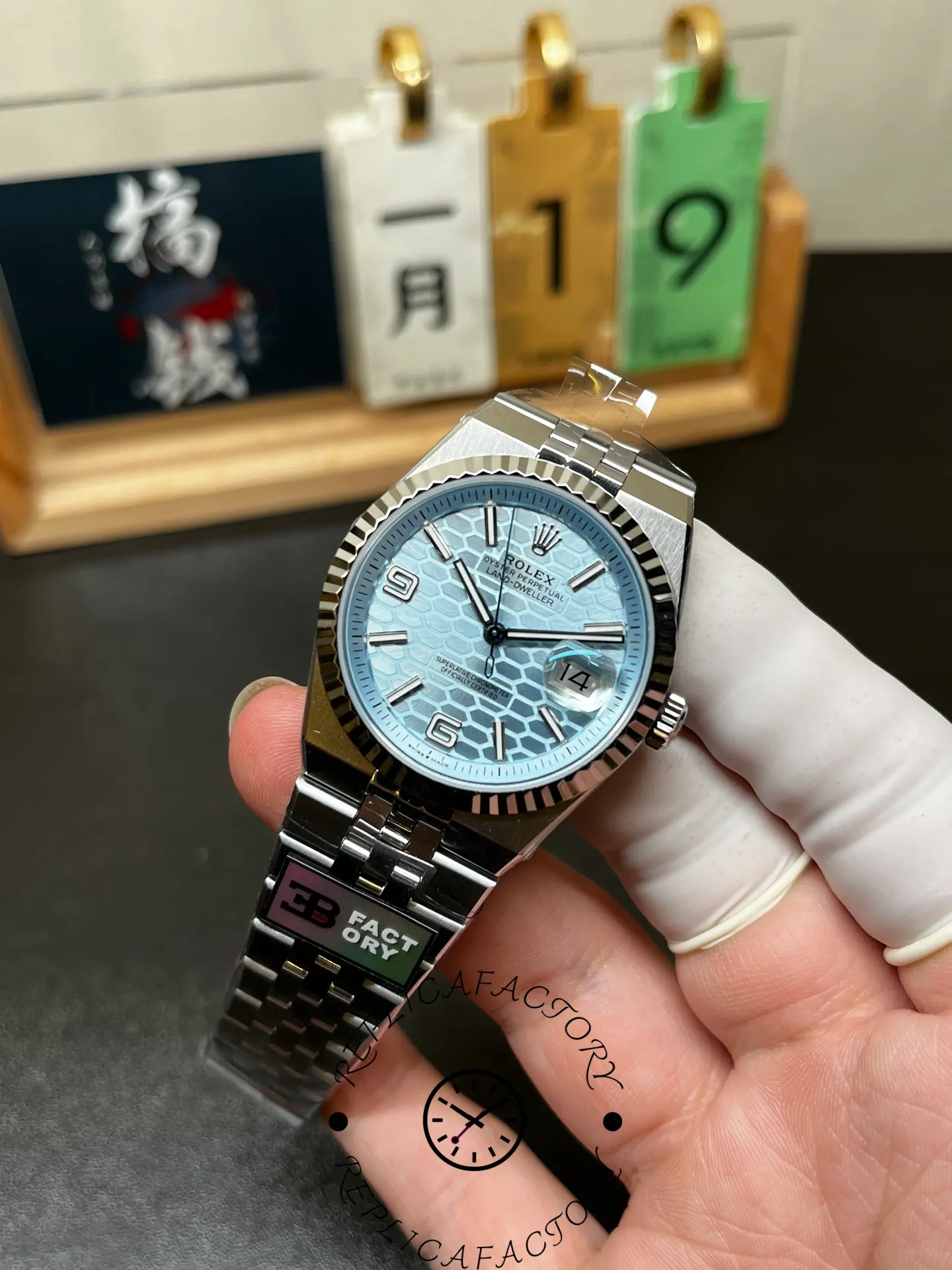 Angled view of Rolex Land-Dweller 36 m127236-0001 highlighting the fluted bezel and integrated steel bracelet.