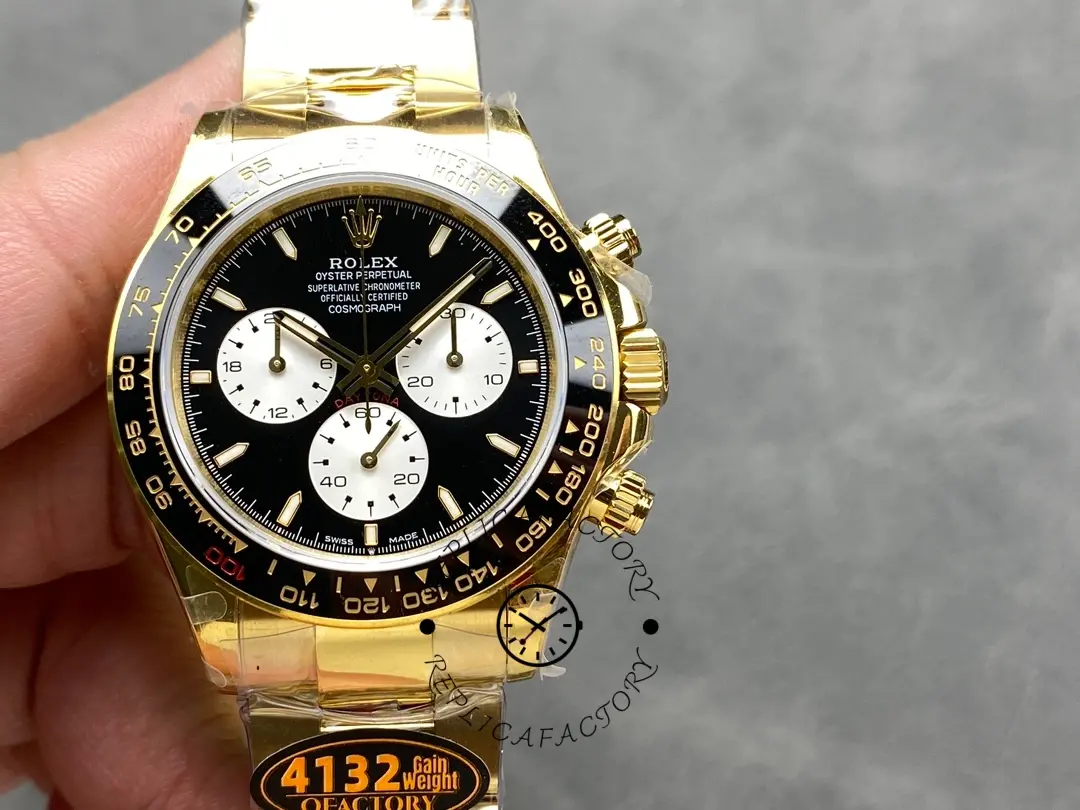 Rolex Daytona 126528LN-0001, close front view in hand showing subdials and bezel.