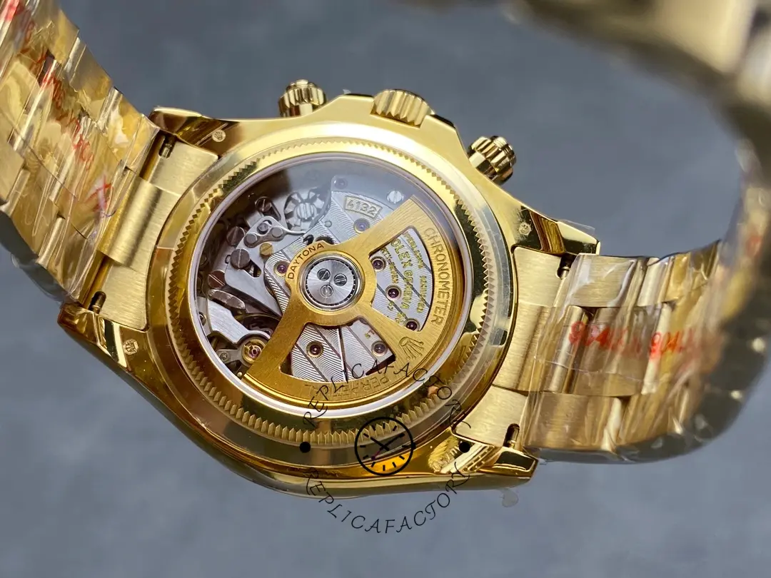 Rolex Daytona 126528LN-0001, caseback view showing showing back and yellow gold bracelet.