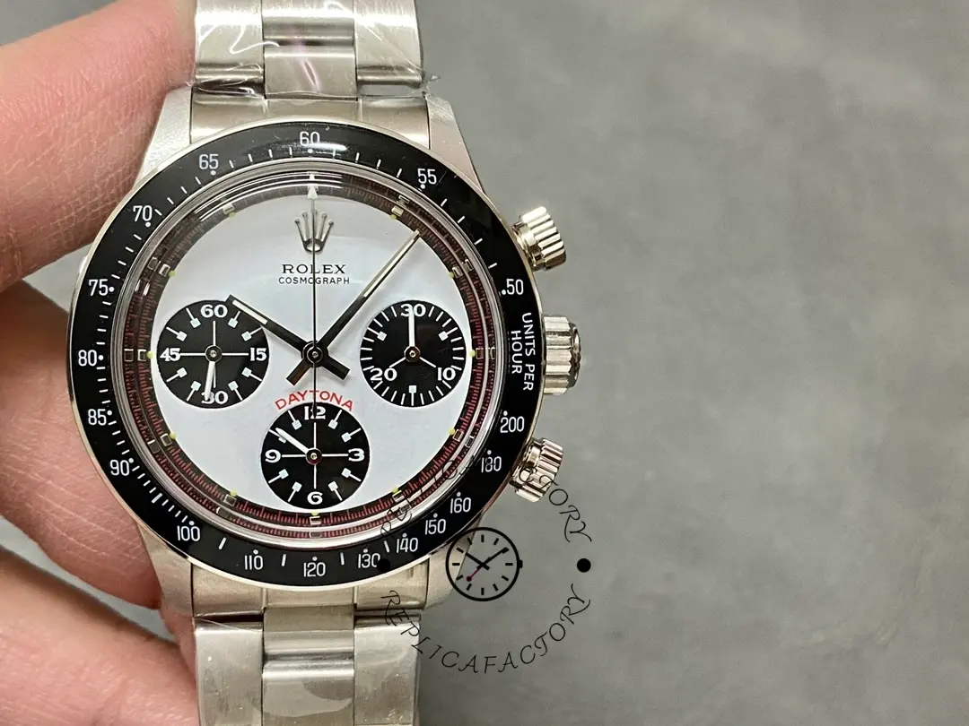 Close-up of Rolex Daytona 6241 showing the white exotic Paul Newman dial and outer minute track.