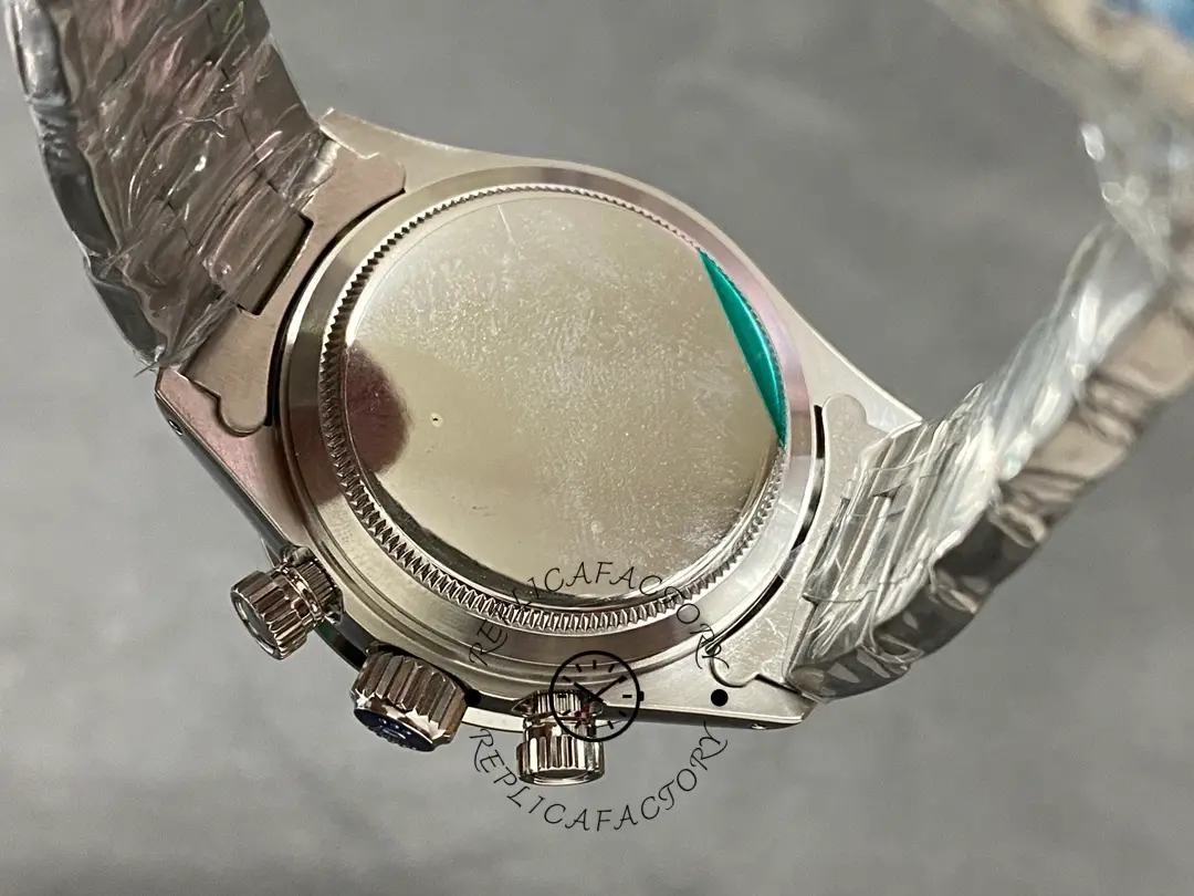 Case back view of Rolex Daytona 6241 showing the smooth steel back and end links.