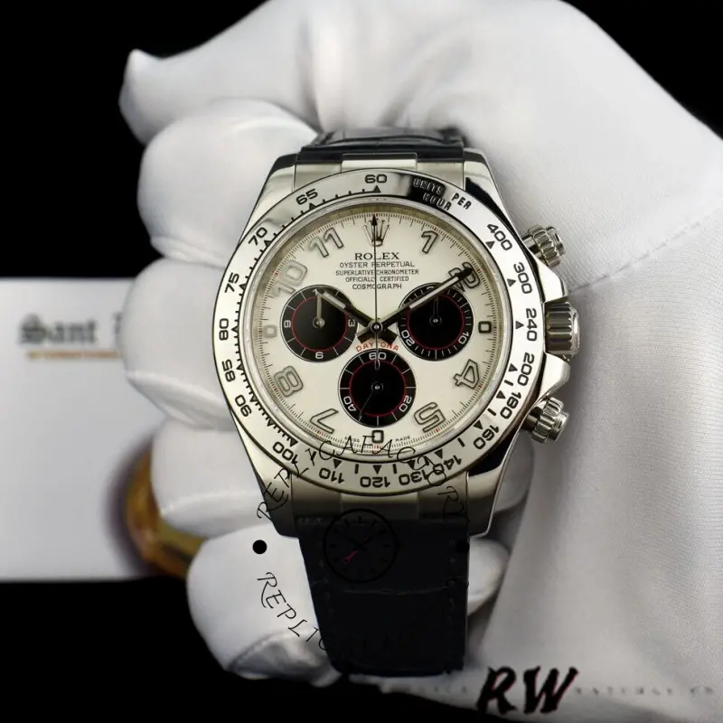 Glove-held front view of Rolex Daytona 116519 showing white dial and black “eyes” subdials.