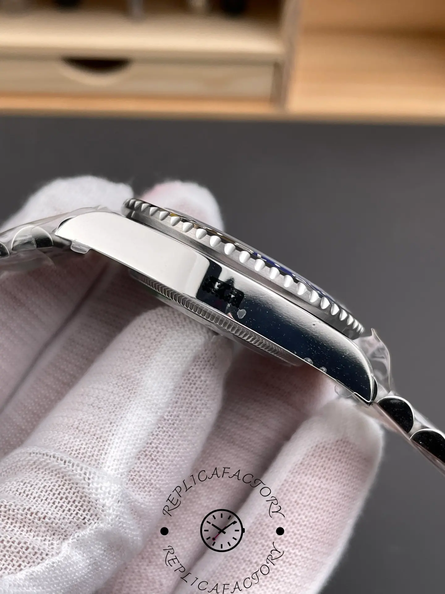 VSF Rolex GMT-Master II 126710BLNR case side profile showing polished steel finish.