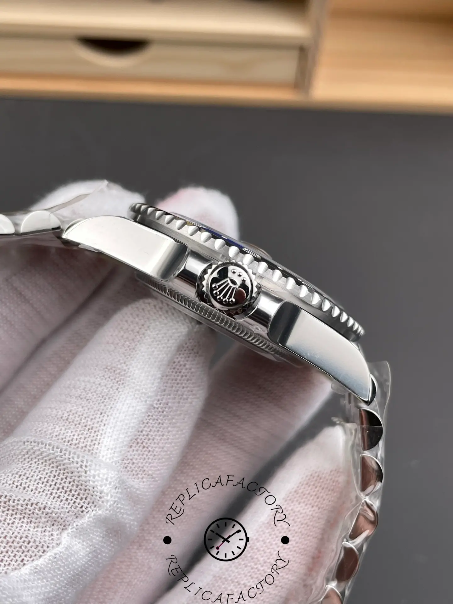 VSF-Rolex-GMT-Master II 126710BLNR side view showing Rolex crown and case profile.